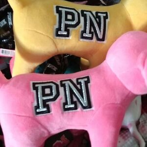Pink and Yellow Plush Dogs